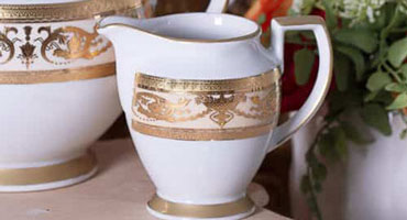 Сахарницы и молочники